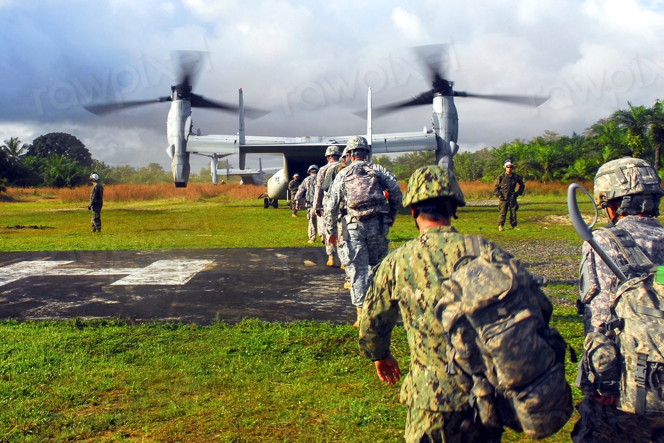 Military soldiers boarding on aircraft